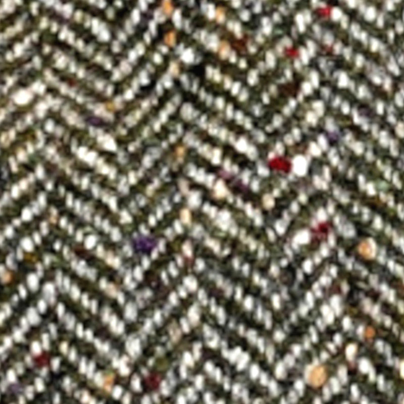 Close-up of Donegal Tweed weave showing flecks and yarn detai